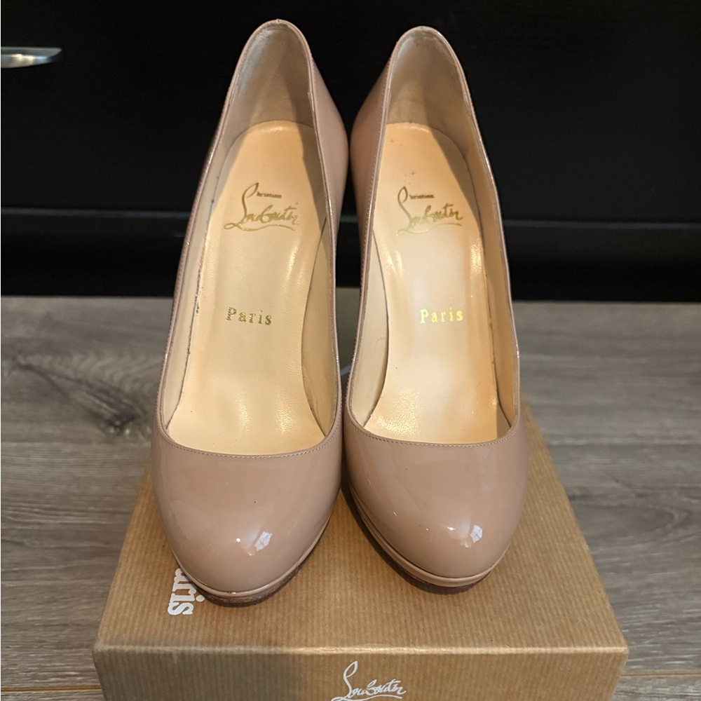 Louboutin Nude Patent Leather Platform Pumps. Box is 37.5 but they are 37.